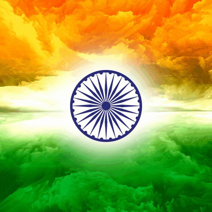 A colorful sky serves as a backdrop for the Indian flag, highlighting its significance and beauty.
