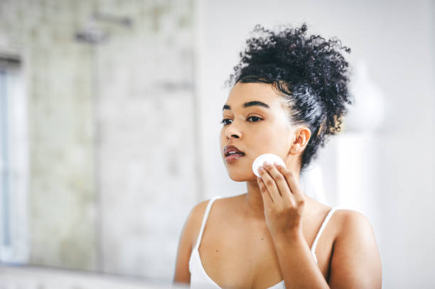 Facial toner applied to oily skin to remove excess oil and impurities